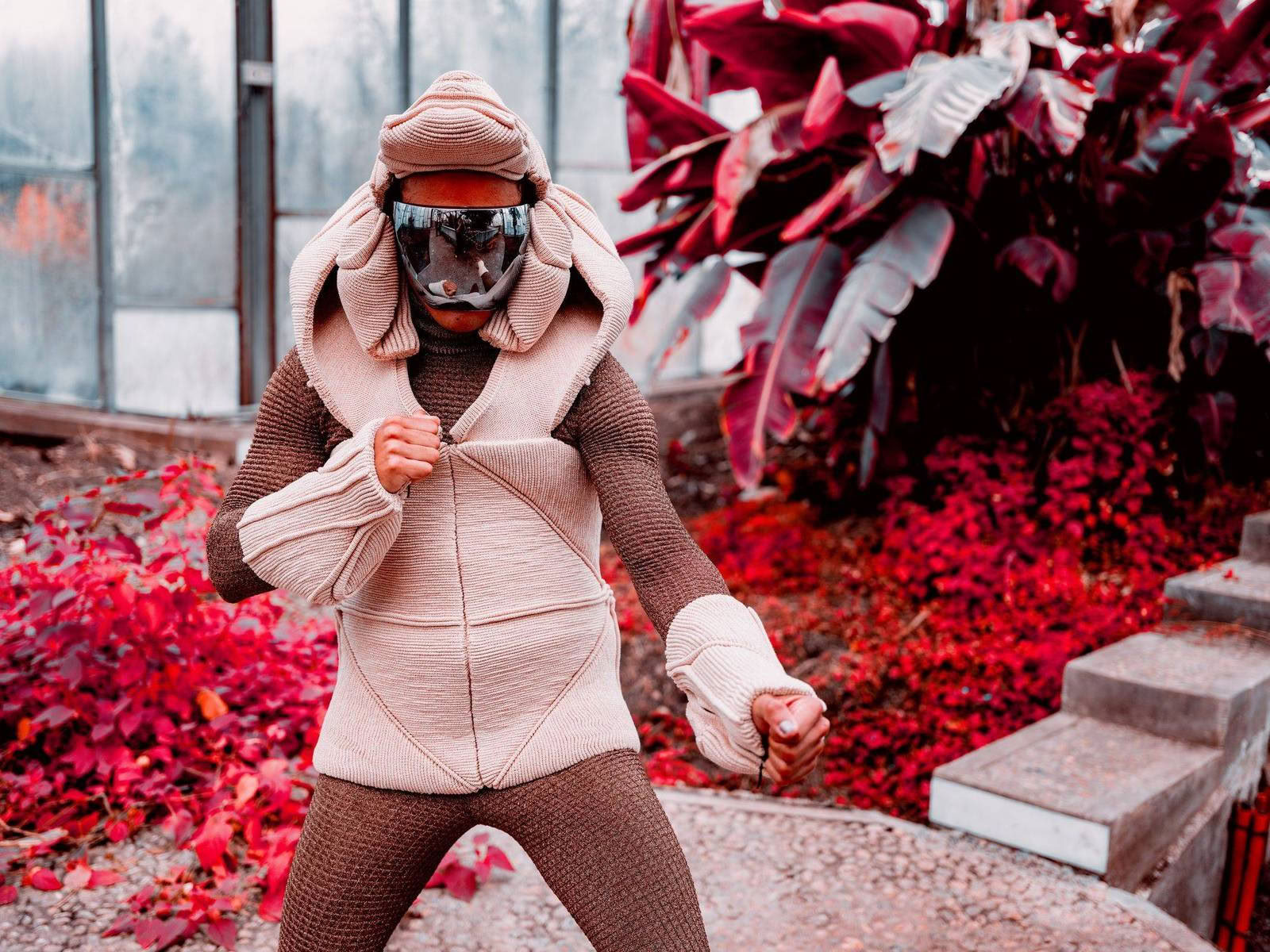 Xavier Brisoux - Textimoov 2024 — For a new collaboration with Xavier Brisoux , Mathieu Drouet chose the equatorial greenhouse at the Jardin des Plantes in Lille, designed by architect Jean-Pierre Secq, as the setting. An infrared film turns chlorophyll into shades of red and purple.
